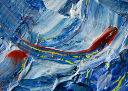 Abstract Artwork featuring red, blue and white colors.